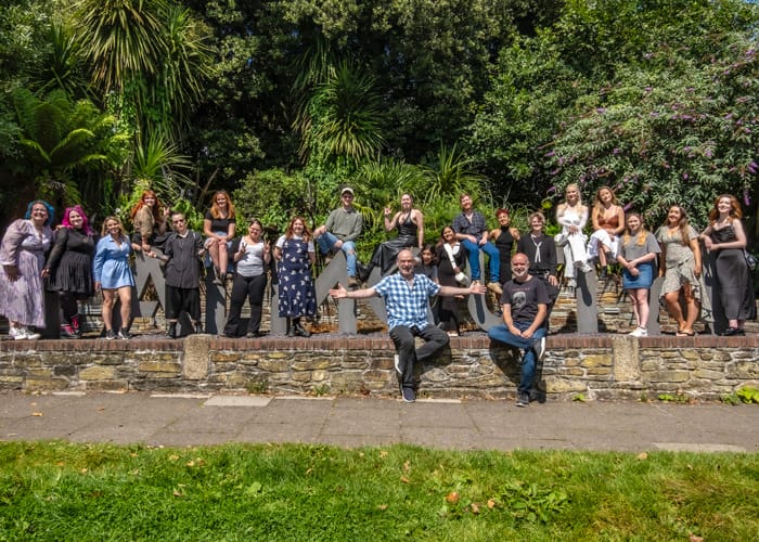 Neill gorton with master's degree students