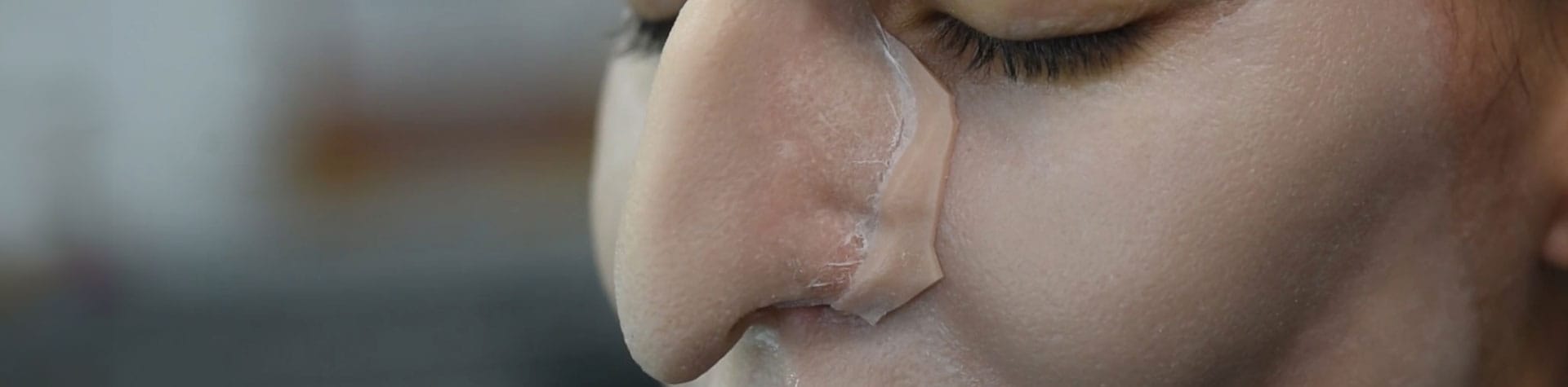 prosthetic nose on woman